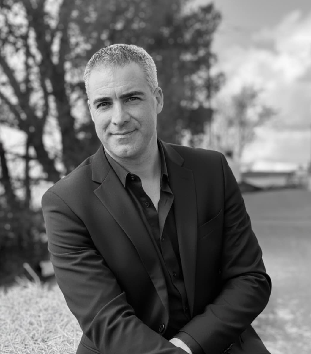 A DJ wearing vibrant headphones, passionately mixing music at a colorful event.